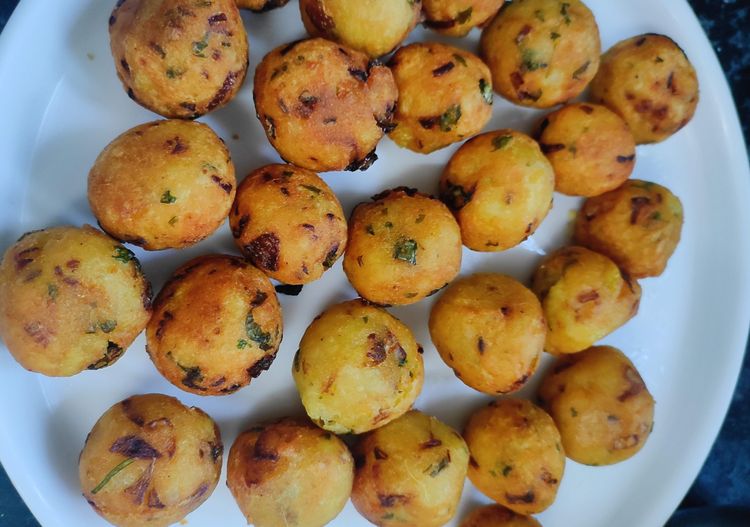 Step 1.1: In a Kadai heat oil and fry the dumplings on low to medium heat till golden brown in colour ,keep stirring at intervals