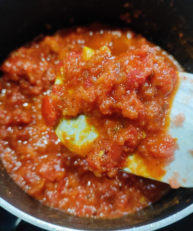 Step 1.1: After a minute, add onion and fry till slightly golden brown and soft