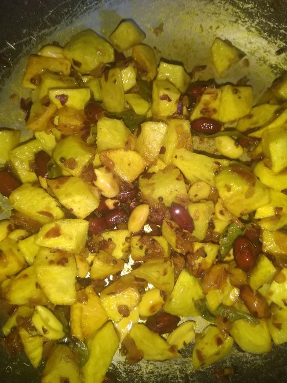 Step 1.1: Add the fried potatoes and peanuts and mix together