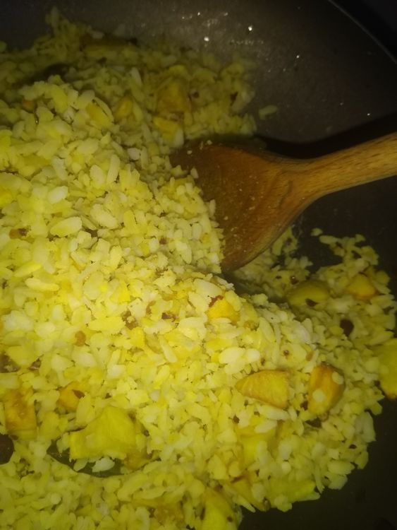 Step 1.1: Add the soaked and drained rice flakes to the prepared mixture to the pan