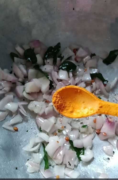 Step 1.2: Add soaked tamarind along with the water, coconut grates, sambar powder, salt, and jaggery