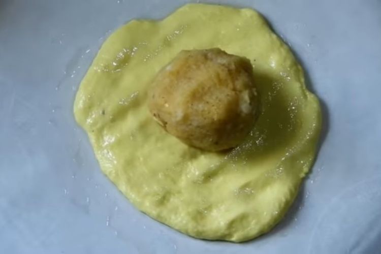 Step 1.1: Take small portions of the dough and flatten them