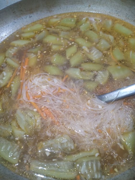 Step 1.1: Add the misua noodles when the ribbed/sponge gourd is about to cook