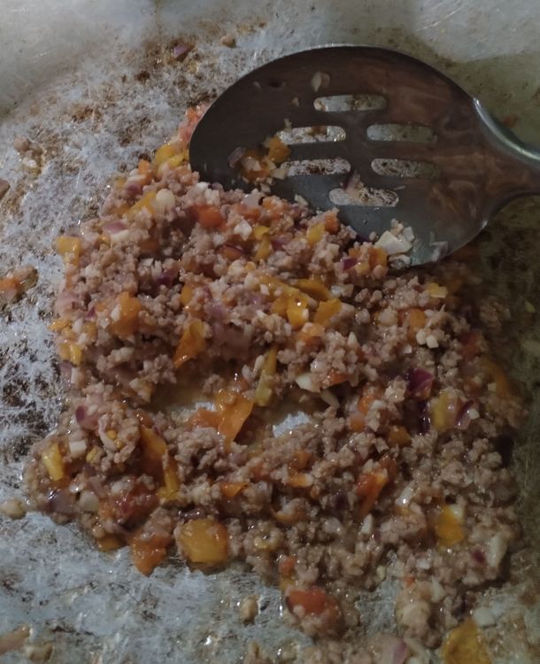 Step 1.1: Add onion, garlic, and tomatoes
