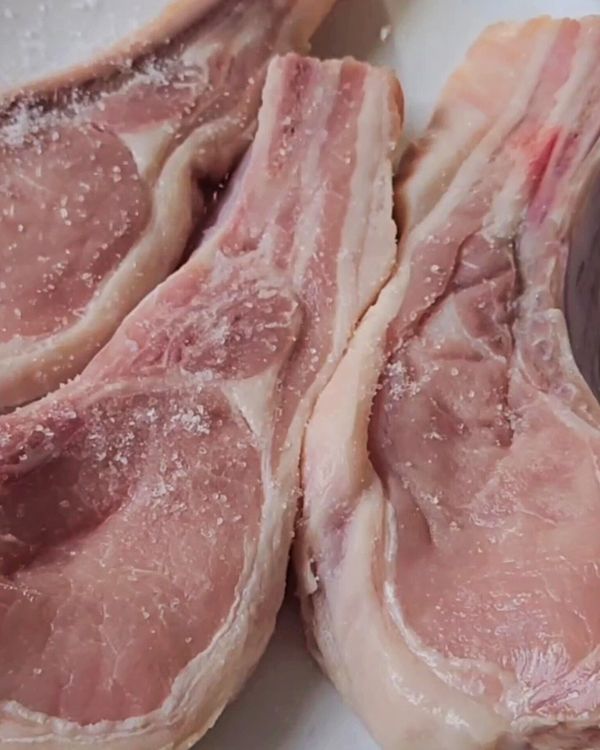 Step 1.1: Season both sides of the pork chops generously with salt and black pepper