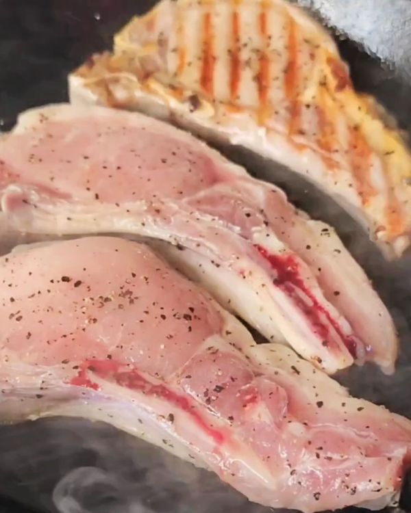 Step 2.1: Carefully add the pork chops to the skillet without overcrowding