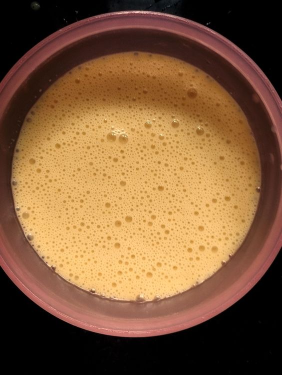 Step 1.1: Transfer the blended custard to a bowl and add the roasted bananas