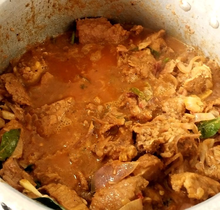 Step 3.1: Add the ground roasted coconut paste and mix well
