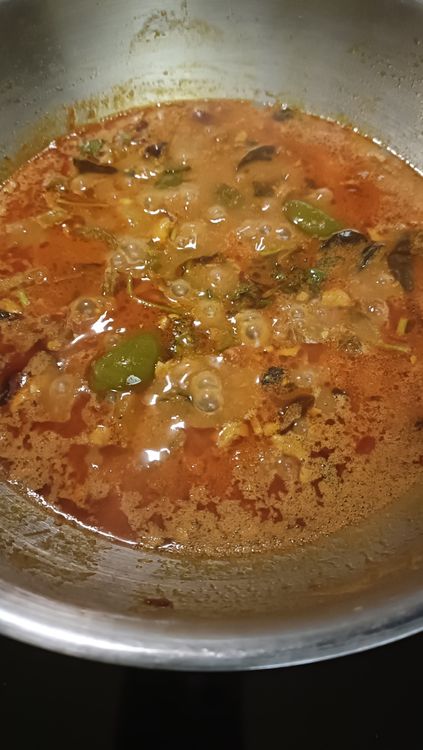 Step 4.1: Cover and cook for 8–9 minutes, stirring occasionally, until the oil separates and the capsicum is fully cooked yet firm