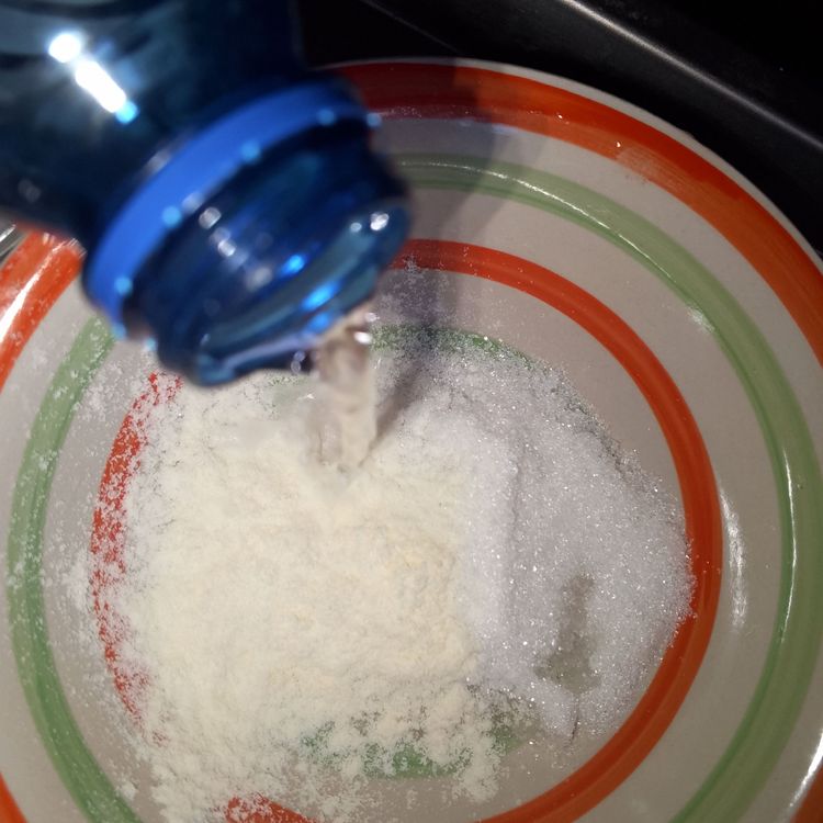 Step 1.1: In a separate bowl, mix the milk, sugar, and water