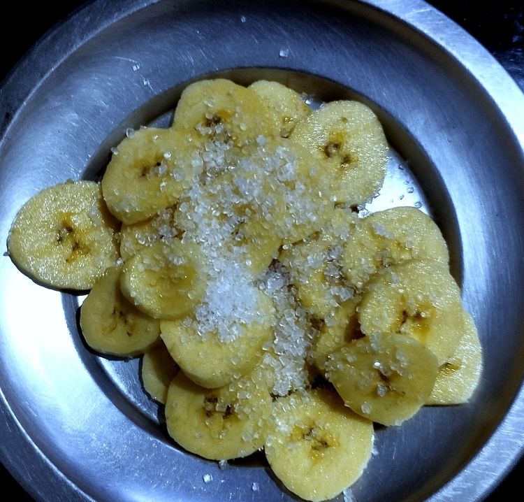 Step 1.1: Add sugar to the banana slices and mix well