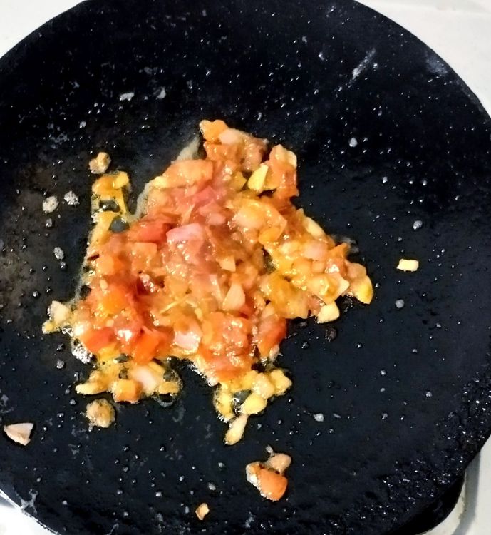 Step 1.2: Add chopped tomato and sauté until it becomes slightly tender