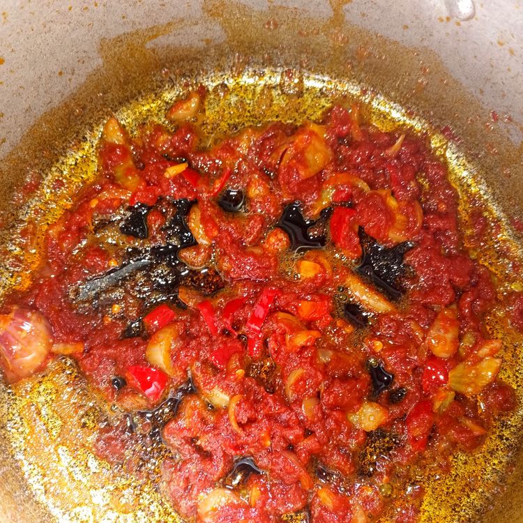 Step 1.1: Add tomato paste to the pot and fry for about 7 minutes before adding your blended pepper mix which you blended earlier