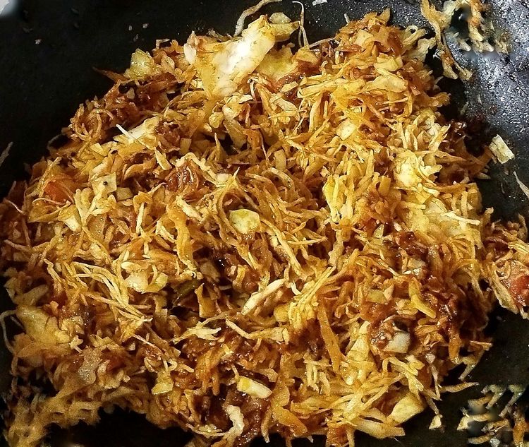 Step 5.1: Mix well with the masala