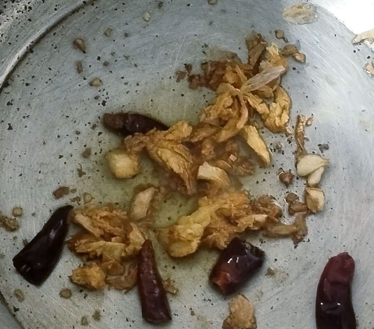 Step 1.1: Add dried red chili and sauté for 30 seconds