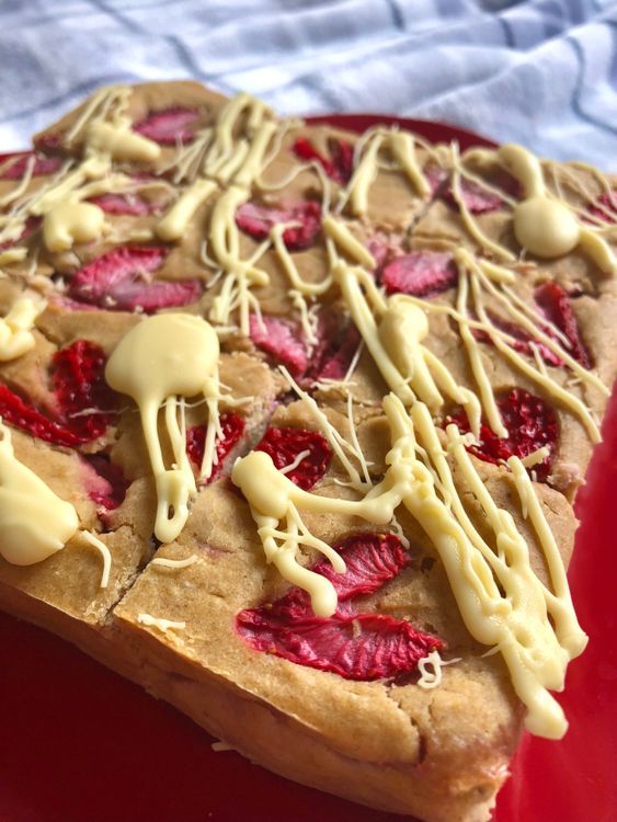 Step 2.1: Melt the white chocolate in the microwave for 20-30 seconds until smooth, then drizzle over the cooled blondies