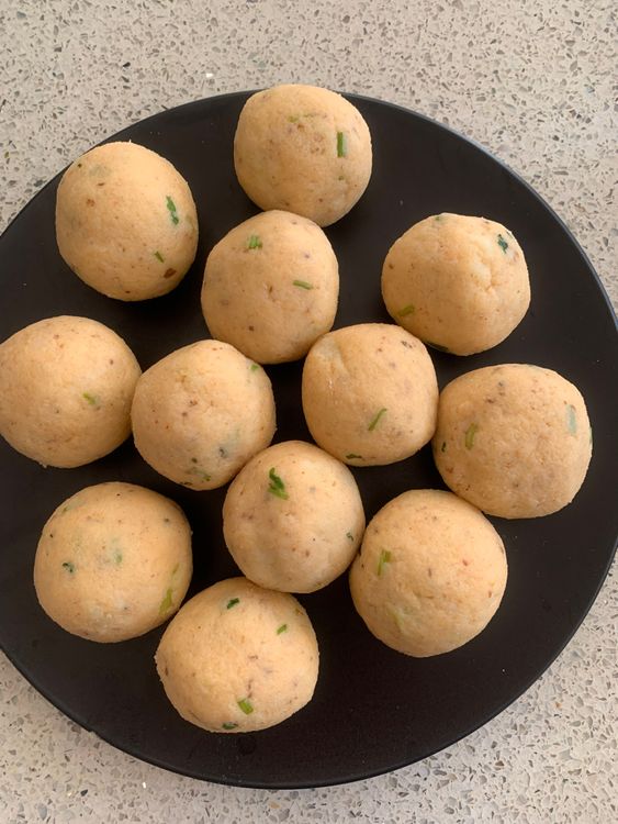Step 1.2: Take small portions of the dough and roll them into round balls