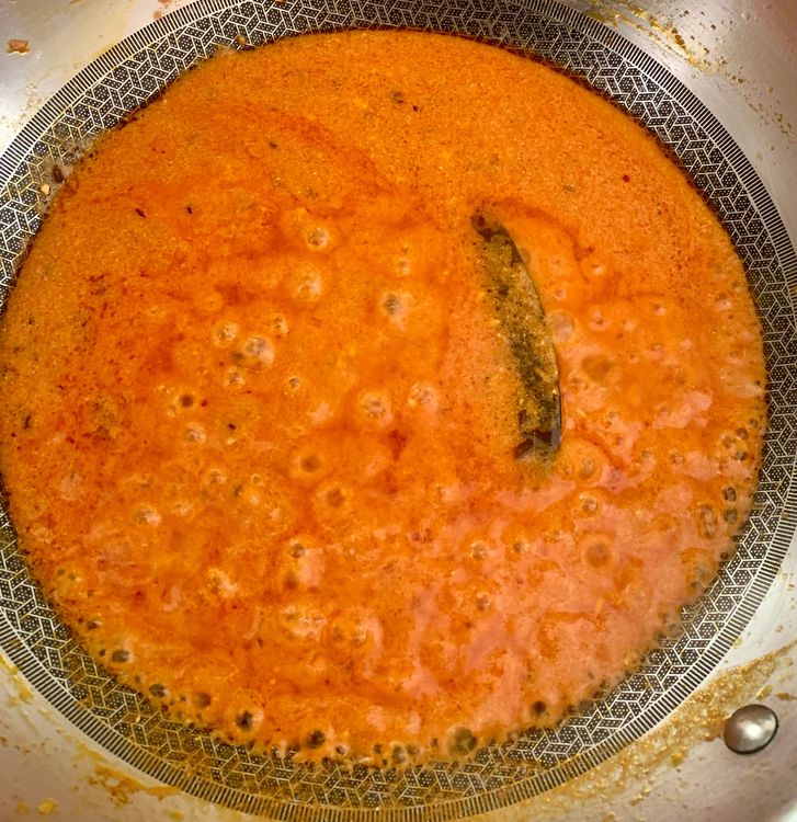 Step 2.2: Gradually add the curd, stirring continuously to avoid curdling