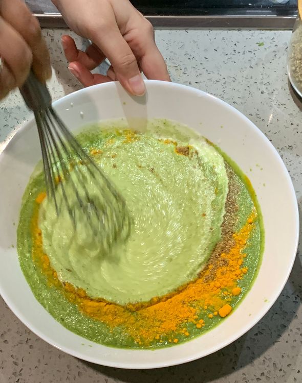 Step 1.2: Add coriander powder, garam masala powder, cumin powder, nutmeg powder, turmeric powder and cream to the yogurt mixture