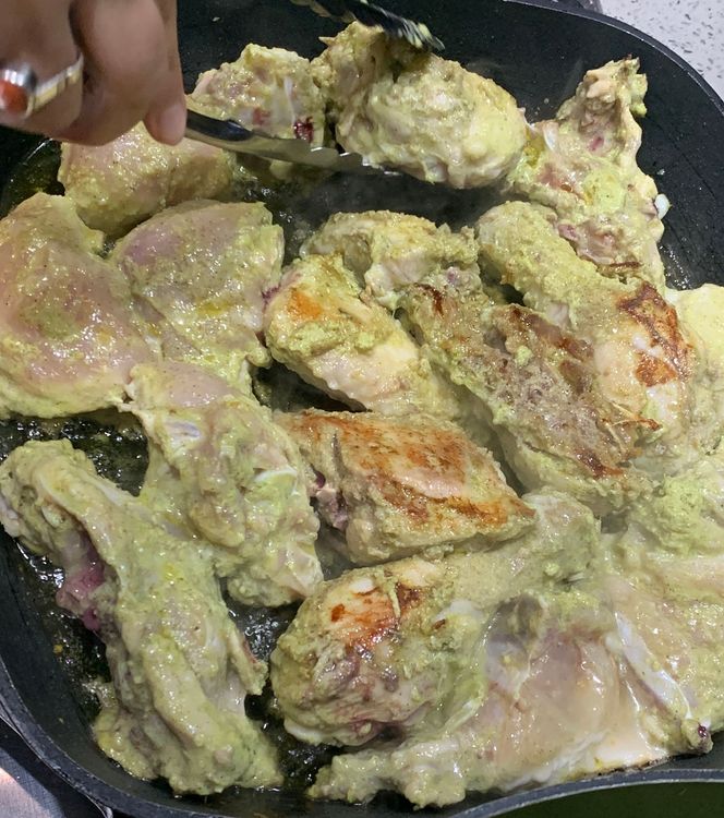 Step 1.2: Place the marinated chicken on the hot grill pan and sear it, flipping occasionally, until it turns slightly golden brown from both sides