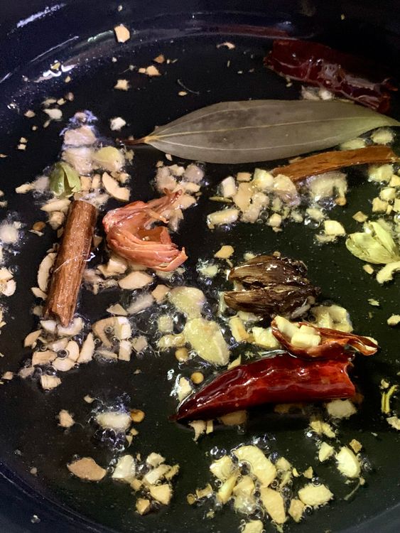 Step 1.1: Stir in chopped ginger and garlic, and cook until slightly golden, about 2-3 minutes