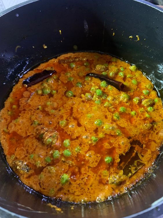 Step 1.1: Add peas to the wok, and mix for another minute