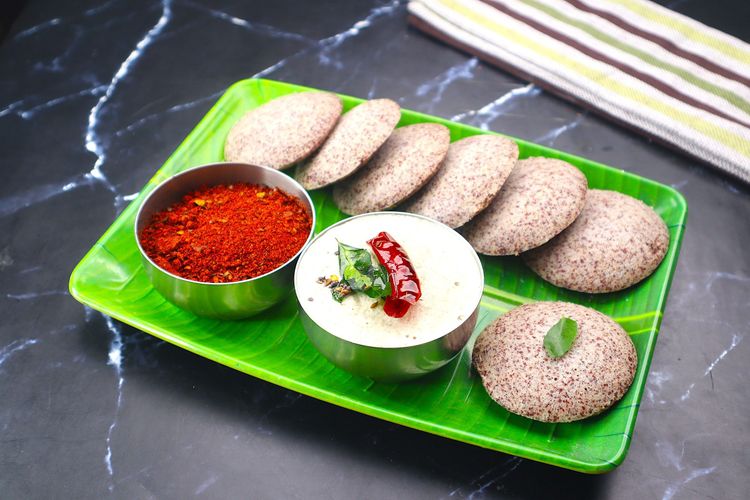 Step 5.1: Serve hot ragi idlis with coconut chutney, tomato chutney, or sambar for a complete meal