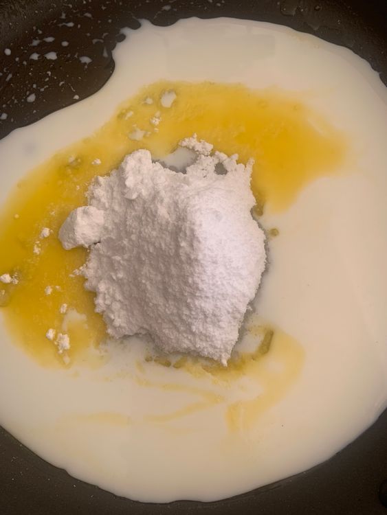 Step 1.1: In a heavy-bottomed pan, pour the remaining ½ cup of milk