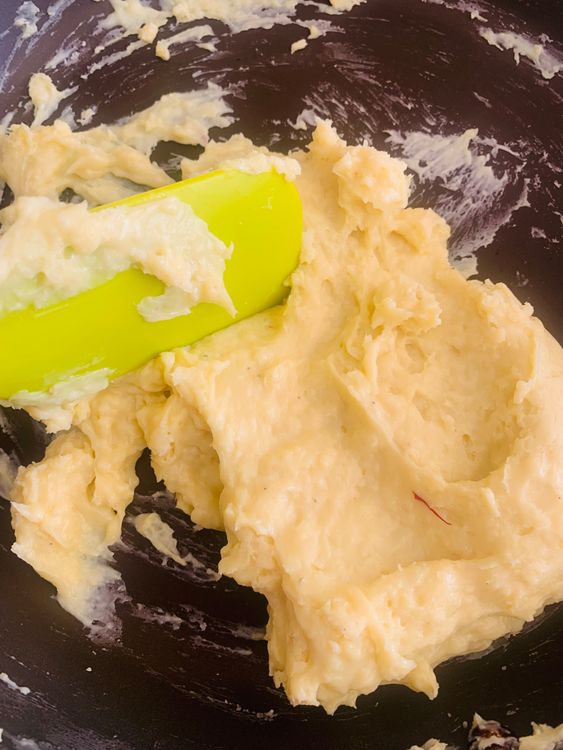 Step 1.1: Cook the mixture over low to medium heat, stirring constantly until it thickens and starts leaving the sides of the pan, forming a pliable dough