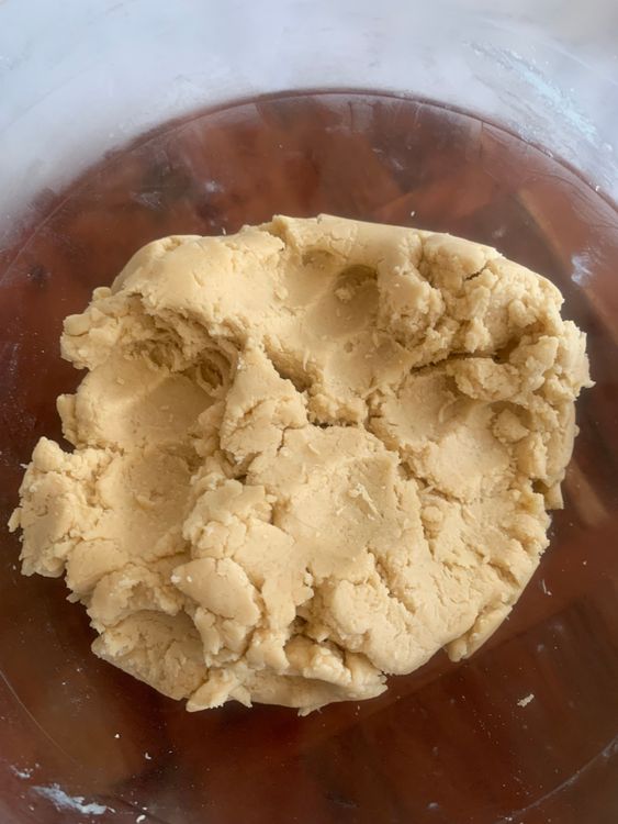 Step 1.1: Gradually incorporate the dry ingredients into the wet mixture, gently folding with a spatula until a soft dough forms