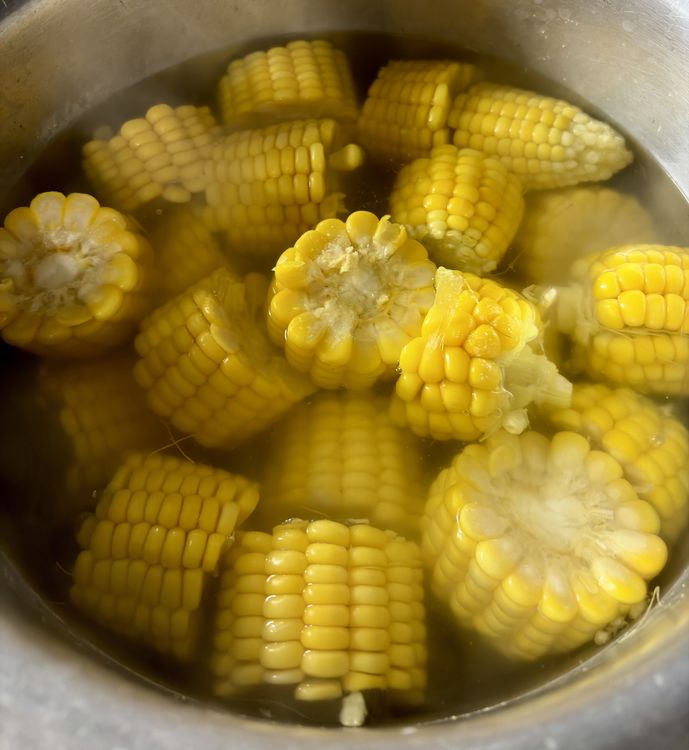 Step 1.2: Boil the corn cobs (whole or cut into pieces) in enough salted water with 1 tablespoon of salt until they are just tender