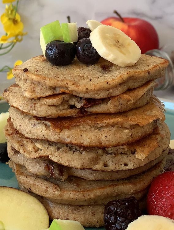 Step 1.1: Serve the pancakes with maple syrup, sliced banana, chopped apples and strawberries on top