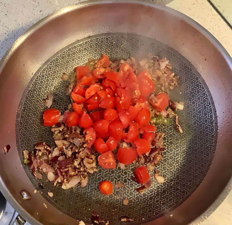 Step 1.1: Add the chopped tomatoes and cook until they turn soft and mushy