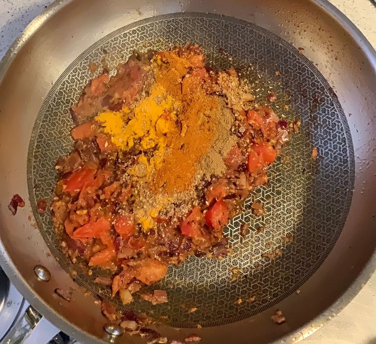 Step 1.1: Mix in the turmeric powder, cumin powder, coriander powder, red chilli powder, and salt