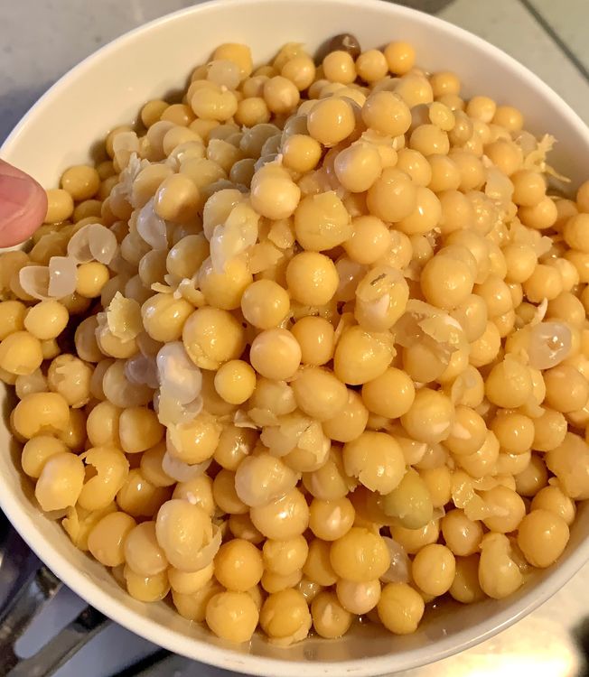 Step 1.1: In a pressure cooker, add the soaked peas, enough water to cover them, and 1 tsp of salt