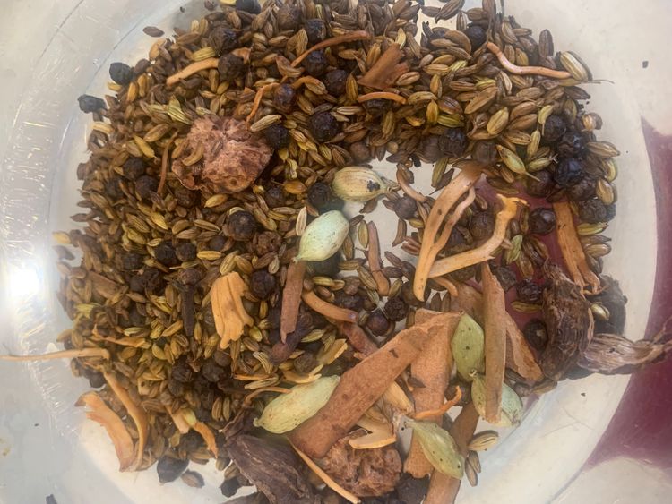 Step 1.1: In a dry pan, roast the fennel seeds, cumin seeds, cloves, cinnamon sticks, green cardamoms, black cardamom, black peppercorns, mace, and nutmeg over medium heat until fragrant