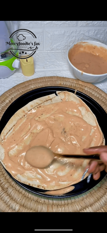 Step 2.2: Place 1 Sharwama bread on a flat surface and apply the cream you’ve just made
