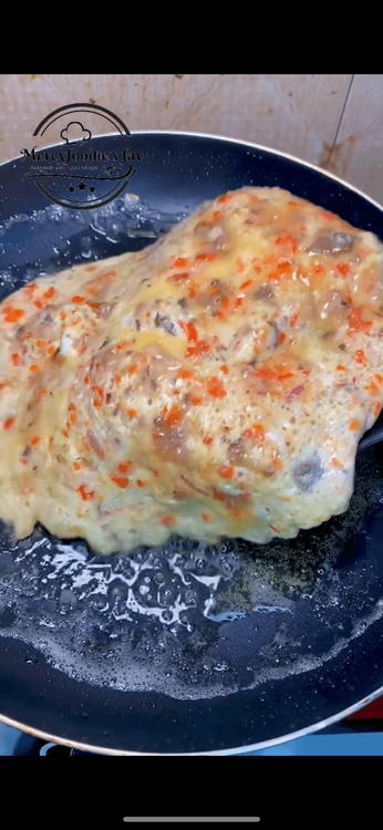 Step 2.2: Flip your egg and place your Sharwama bread ontop, flip it over and allow to toast a little