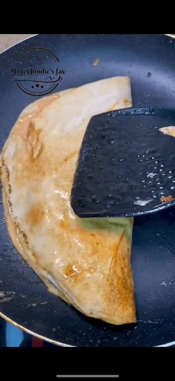 Step 2.6: Flip your egg and place your Sharwama bread ontop, flip it over and allow to toast a little