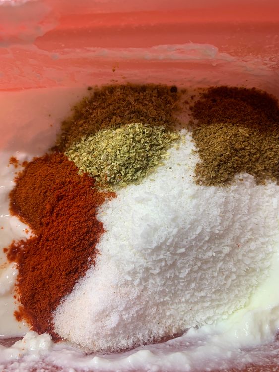 Step 1.1: Add curd, grated fresh coconut, salt, coriander powder, cumin powder, red chilli powder, and kashmiri chilli powder in a mixing bowl