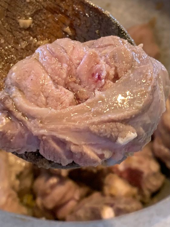 Step 1.2: Add the mutton pieces to the pot and mix well