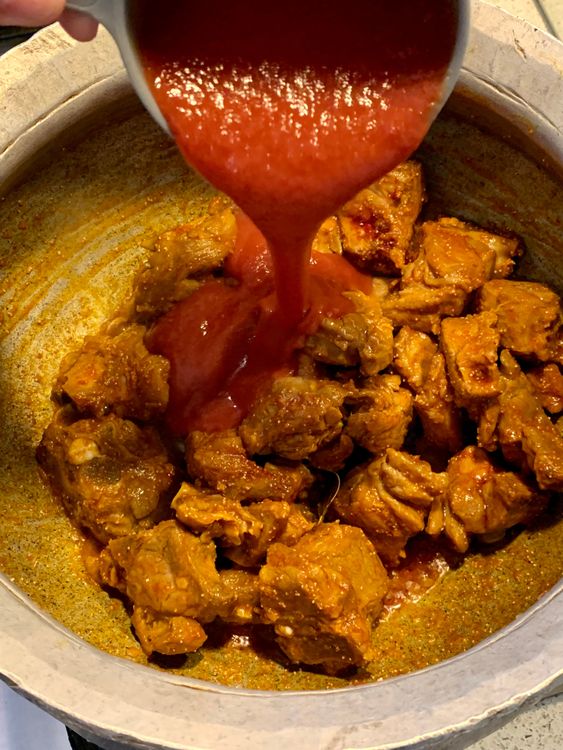 Step 1.1: Now, add the ground tomato or puree and mix
