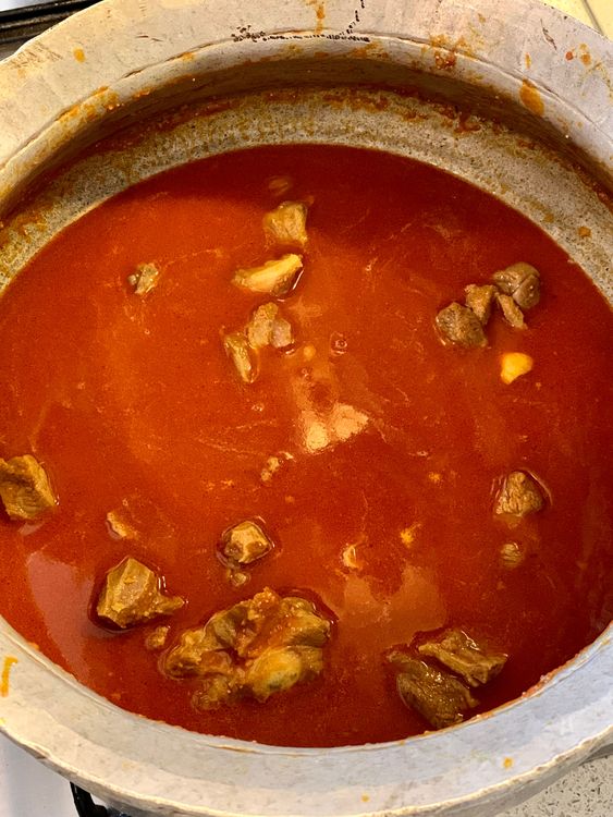 Step 1.1: Pour in the water and bring the stew to a boil, then reduce the heat to low