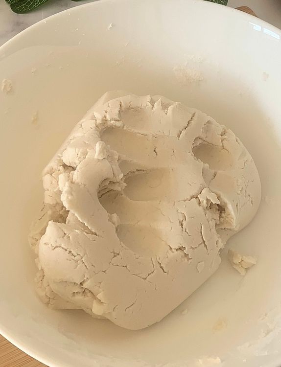 Step 1.1: Gradually add water while mixing with a spoon