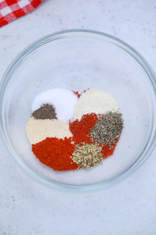Step 1.1: Mix paprika, salt, garlic powder, black pepper, onion powder, cayenne pepper, dried oregano, and dried thyme together