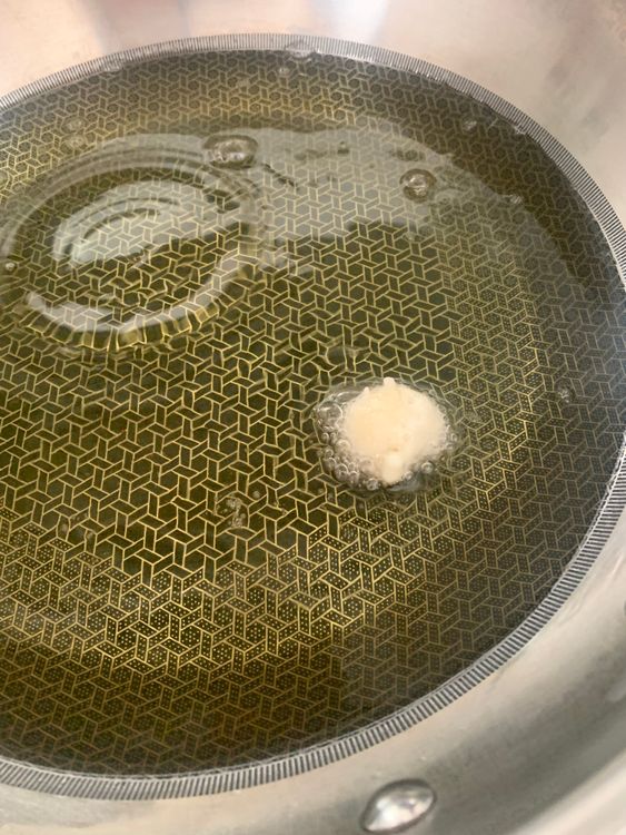 Step 1.1: Heat oil in a deep frying pan over medium-high heat