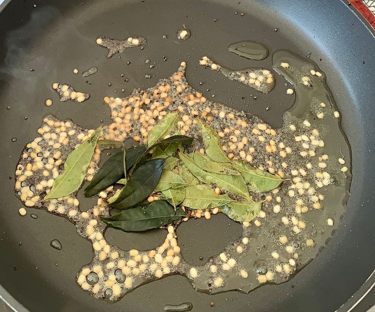Step 1.1: Heat oil in a pan or skillet over medium heat