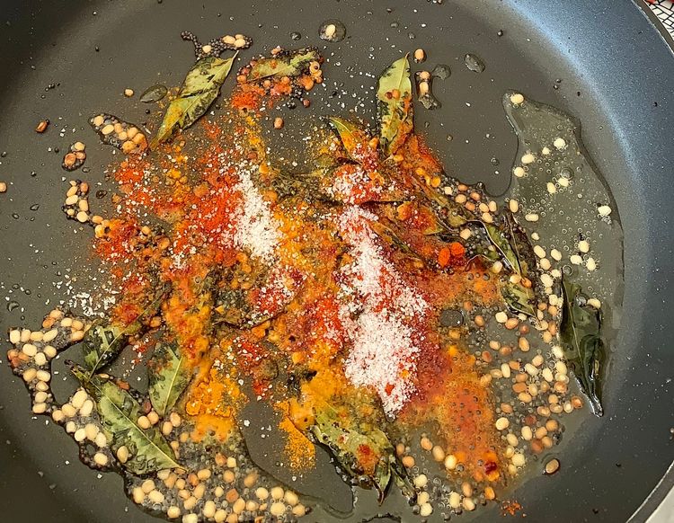 Step 1.1: Add turmeric, red chilli powder, and salt to the pan
