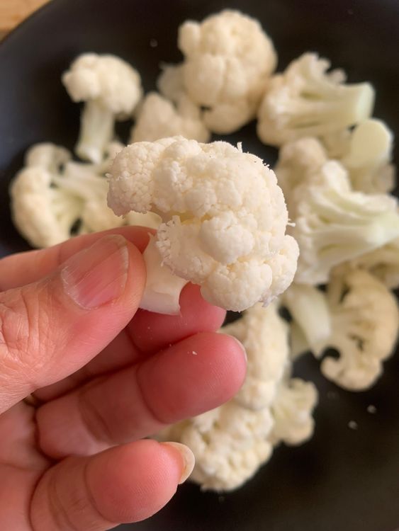 Step 1.1: Cut the cauliflower into bite-sized florets
