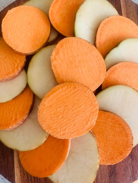 Step 1.1: Wash the potatoes and sweet potato thoroughly, then slice them into 1/4-inch thick rounds
